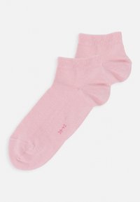 Calzini alla caviglia rosa realizzati in un tessuto morbido, con un polsino a coste e un piccolo logo del marchio stampato in un colore contrastante.