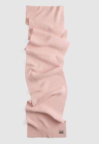 Ribbed pink scarf made of soft knit material. Features a small logo tag on one end. Shaped with a wavy, draped appearance.