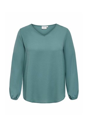 Langærmet teal bluse med V-hals og elastiske manchetter, lavet af tekstureret stof, vist på en hvid baggrund.