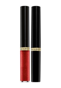 Lucidalip gloss rosso glitterato in un tubo trasparente con tappo nero. Presenta scritte dorate per il branding. Texture liscia con un finish lucido.