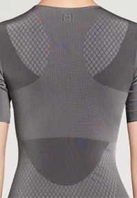Gray athletic top with short sleeves, featuring a textured diamond pattern, mesh sections, and a logo at the back.