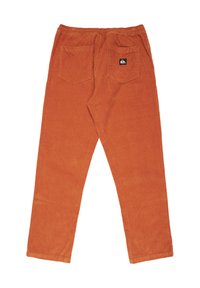 Pantalones de pana naranja con una cintura elástica, dos bolsillos traseros y una pequeña etiqueta de logo cerca del bolsillo derecho. Diseño de pierna recta.