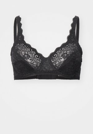 Bralette in pizzo nero con bordi ondulati, motivi floreali e spalline regolabili. Include una chiusura a gancio e occhiello sul retro.