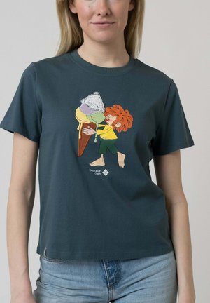 Woman wearing dark green shirt with cartoon red-haired child holding large melting ice cream cone printed on front.