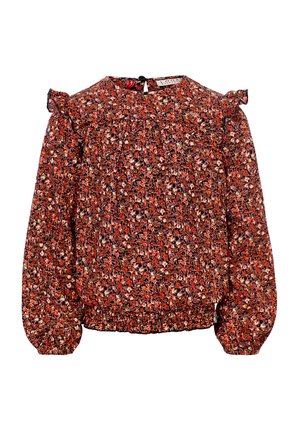Rode bloes met bloemenmotief van textuurstof, opbollende lange mouwen, geplooide accenten op de schouders en een keyhole sluiting op de rug.