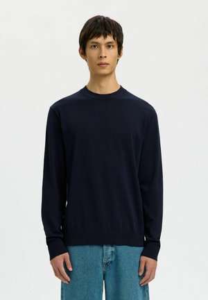- Sweter