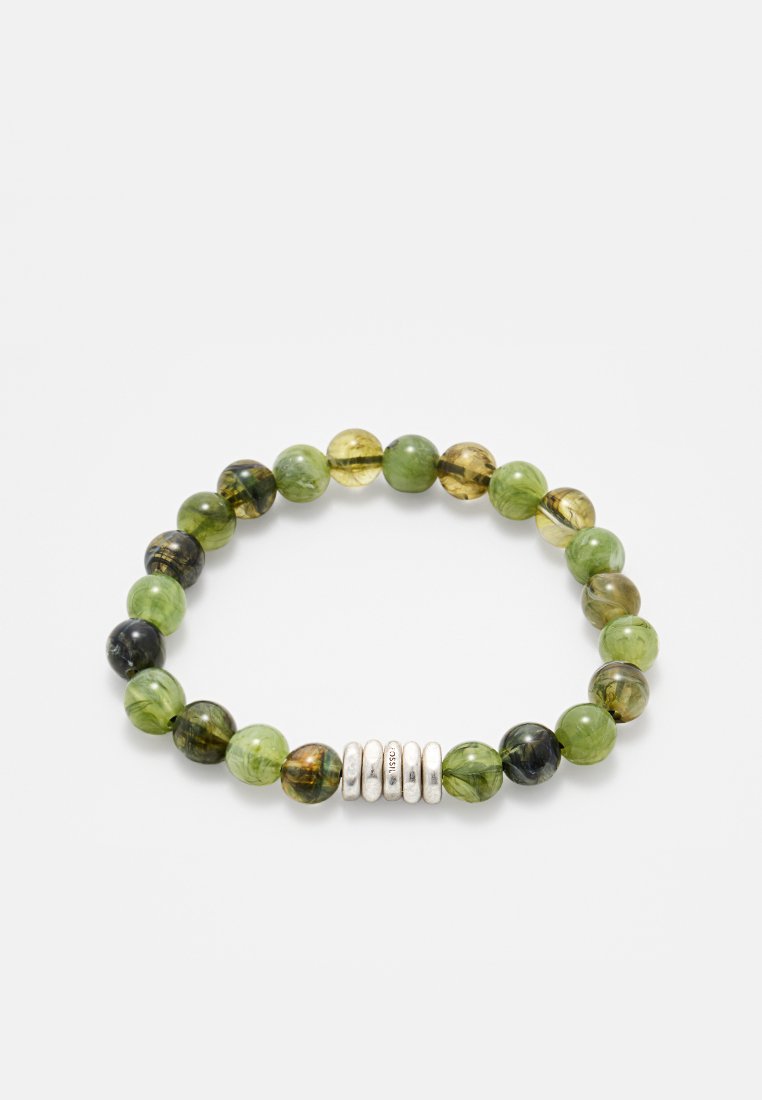 Bracciale in pietre di giada verde e nere con uno spacer centrale in argento composto da quattro segmenti arrotondati, che mostrano texture e trasparenze variabili.