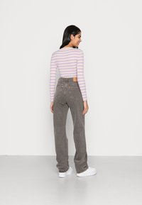 Weekday ROWE EXTRA HIGH - Calças de ganga de perna direita - desert