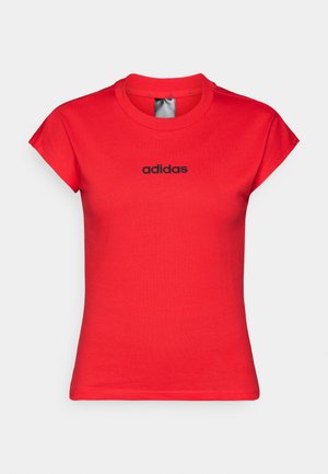 Red fitted t-shirt made of cotton with rolled short sleeves and a black "adidas" logo on the chest. Smooth texture and round neckline.