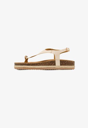 Beige læder flip-flop sandaler med korksål, tekstureret jute-detaljering og justerbar ankelstrop. Gummisål med zigzag-mønster.