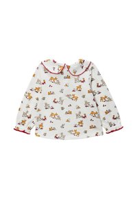 Chemise blanche à manches longues avec un col bordé de rouge, présentant un motif ludique d'animaux et de fleurs sur l'ensemble, et des poignets élastiques.