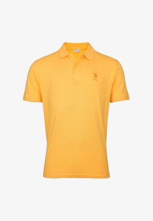 Gele polo shirt van katoen met een klassieke kraag, korte mouwen en een klein geborduurd logo op de borst. Soepele textuur.