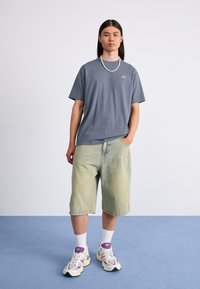 New Balance SPORT ESSENTIALS LOGO - Triko s potiskem - graphite