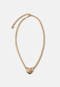Gouden ketting met een hartvormige hanger bezaaid met kleine kristallen en een verstelbare sluiting met een driehoekige charme.