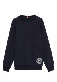 Sudadera de marina con cuello redondo, puños y dobladillo acanalados. Presenta un parche de logo en blanco en la parte inferior delantera y un acento rojo en el cuello.