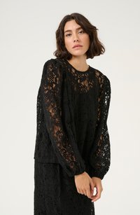 Black lace top featuring long, puffed sleeves and a round neckline. Intricate floral pattern throughout, with a slightly sheer texture.