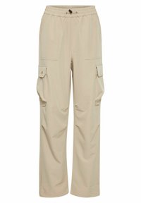 Pantalons cargo beiges à coupe décontractée, taille élastique, cordon de serrage, poches latérales et coutures renforcées. Texture de tissu lisse.