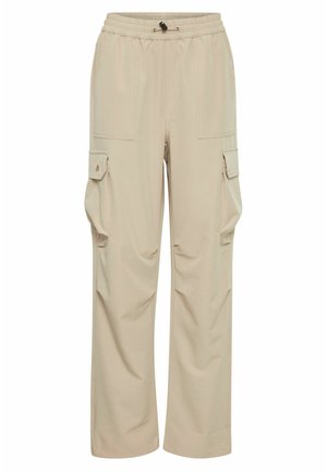 Pantalons cargo beiges à coupe décontractée, taille élastique, cordon de serrage, poches latérales et coutures renforcées. Texture de tissu lisse.