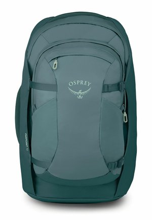 Mochila teal Osprey Farpoint 70 con bolsillos frontales y laterales y correas de compresión ajustables