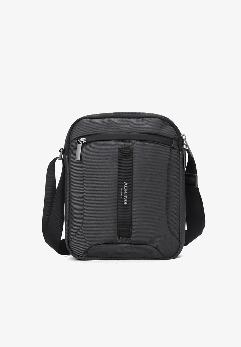 Sac bandoulière compact noir avec sangle réglable, poche avant zippée et détail en tissu vertical avec l'inscription "AOKING".
