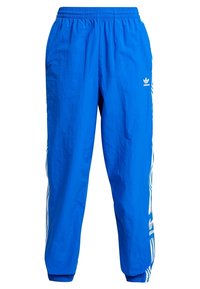 Pantalones deportivos azules de tejido ligero, con cinturilla elástica y rayas blancas a lo largo de los costados con un acento de logo.