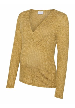 Top de maternité en tissu côtelé doré, avec un décolleté en V profond, des manches longues et une silhouette ajustée. Motif texturé sur l'ensemble.