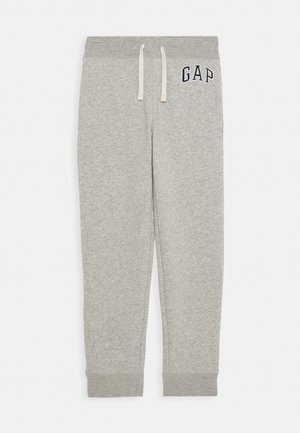 Lysegrå fleece joggingbukser med elastisk talje, hvide snørrebånd, ribbede manchetter og "GAP" logo på venstre hofte.