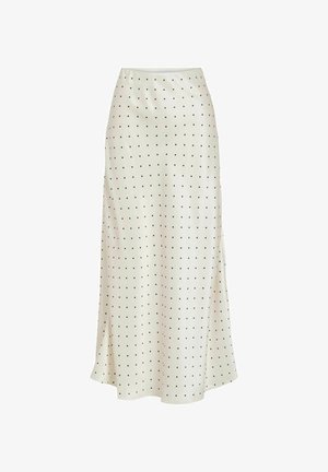 Ilgas baltas sijonas iš lygaus audinio, puoštas mažais juodais taškeliais ir šoniniu plyšiu, su aptempta juosmens juosta ir laisvu siluetu.