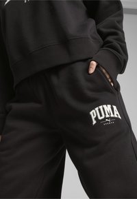 Puma Jogginghose - black