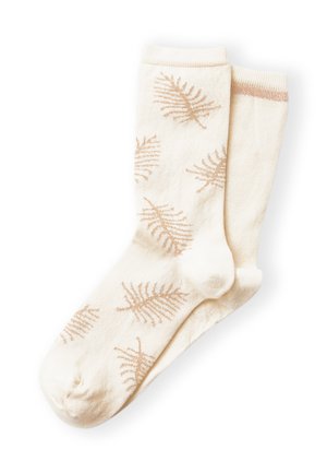Chaussettes couleur crème avec des motifs de feuilles de fougère marron clair, des bords-côtes et une bande beige près du haut d'une chaussette.