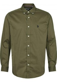 Olivgrön skjorta med knappar, långa ärmar, en krage och en liten broderad logotyp på vänster bröst, tillverkad av ett mjukt tyg.