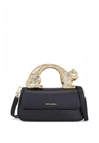 Melnas ādas soma ar zelta rokturi kaķa formā. Soma ir gludas tekstūras, ar pārklājuma aizdari un noņemamu plecu siksnu.