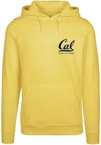 Geltona bliuzono su raišteliais, kišenė kangaroo stiliaus ir pintomis rankovėmis. Ant jo spausdinta "Cal" ir "Kalifornijos universitetas" tamsiai mėlyna spalva.