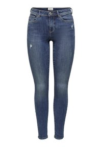 Skinny-fit denim jeans in dark blue with distressed patches, five-pocket design, and button-fly closure. Made of cotton blend fabric.