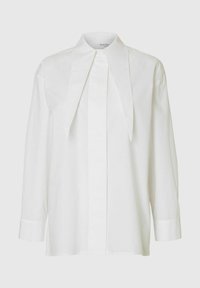 Valge pikakä sleeve'iga pluus, millel on suurenenud terav krae ja peidetud nööpide rida, esitatud heleda tausta ees.