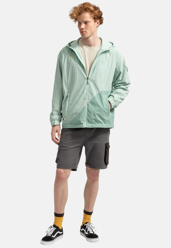 PAKARU - Regenjacke / wasserabweisende Jacke - mint