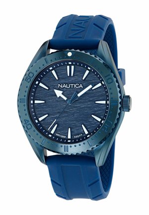 Blue Nautica wristwatch with textured dial, large white hour markers, rotating bezel, and silicone strap showing time 11:07:36.