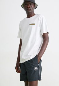 Converse RETRO CHUCK ELEVATED - Tréningruha alsók - black