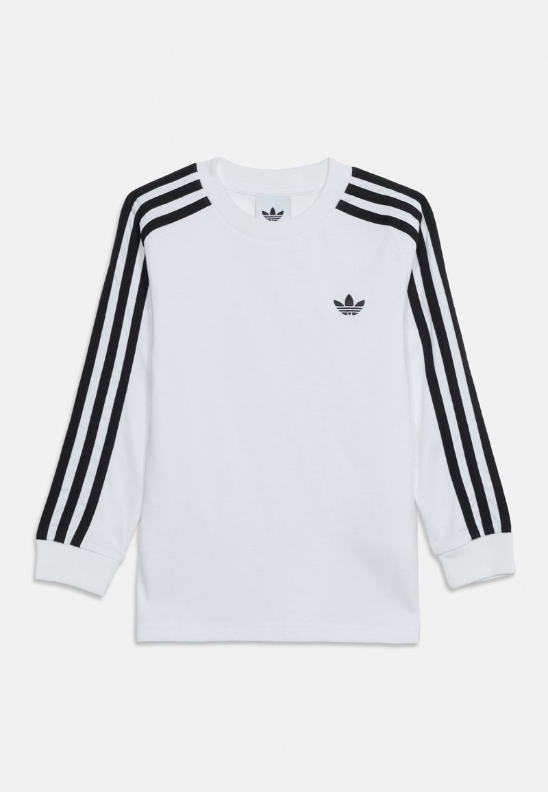 Fehér hosszú ujjú Adidas póló fekete három csíkkal az ujjakon és kis fekete Adidas trefoil logóval a bal mellrészen.