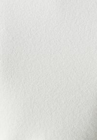 White fabric texture with a fine, soft knit pattern. The surface appears smooth and slightly shiny, reflecting light subtly.