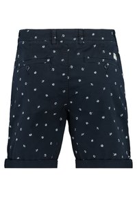 Námořnické modré šortky s bílým květinovým vzorem, bavlněný materiál, dvě zadní kapsy a ohrnuté nohavice pro ležérní design.