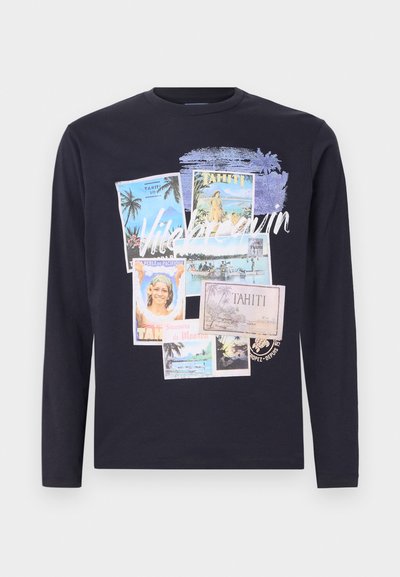 Navy long-sleeve t-shirt featuring a collage of pastel postcards with tropical themes and the word "Tahiti" in white text.