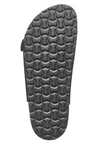 Svart gummisul med ett zigzag-mönster för grepp. Släta kanter och en platt design ökar stabiliteten.