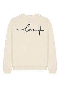 Felpa color crema con un design in nero che riporta la scritta "love" con una linea del battito cardiaco sotto, maniche lunghe e polsini a costine.