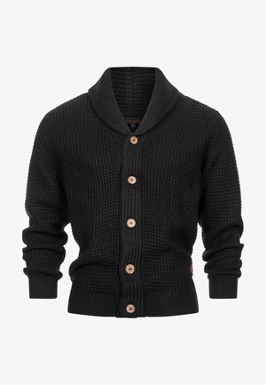 Zwarte gebreide cardigan met een sjawlboord, voorzien van houten knopen, geribbelde manchetten en een gestructureerde stof. Slanke pasvorm, middellange lengte.