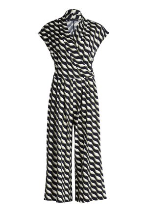 Combinaison bleu marine et crème avec un motif ondulé, manches courtes, décolleté en portefeuille et jambes larges. Fabriquée en tissu léger et texturé.