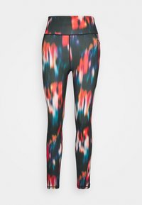 Tights i ett stretchigt material med ett livligt abstrakt mönster av röd, blå och vit på en svart bakgrund. Hög midja och figurnära passform.