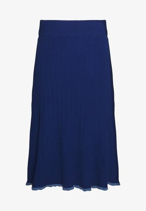 Kolová midi sukně z přiléhavého námořnicky modrého žebrovaného úpletu s přiléhavým pasem a mírným rozšířením u lemu s vlnitým okrajem.