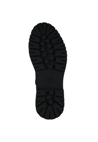 Black rubber shoe sole with prominent treads, hexagonal patterns, and a central branding label. Size marked as 37.