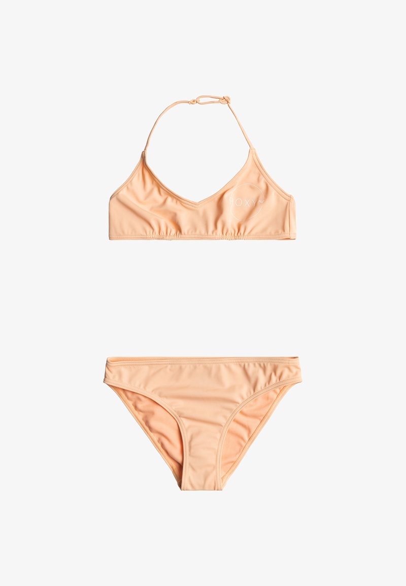 Pfirsichfarbene Bikini-Set mit V-Ausschnitt-Bralette-Oberteil und verstellbaren Trägern sowie passenden niedrig geschnittenen Unterteilen. Weicher, glatter Stoff mit gerafften Details.